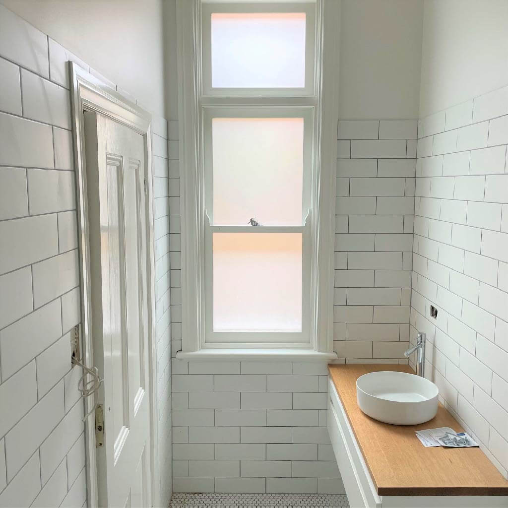 Bathroom with privacy window film