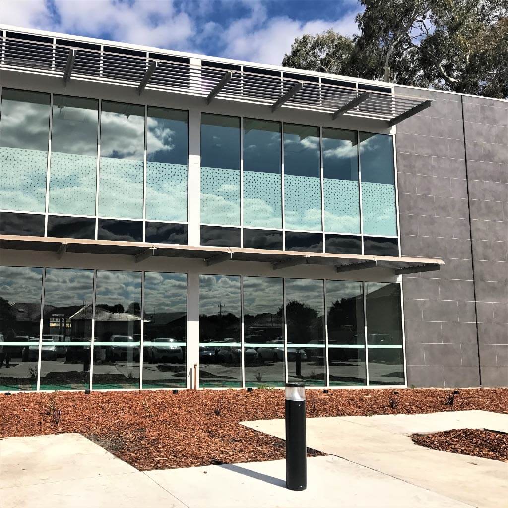 Business building exterior with window film