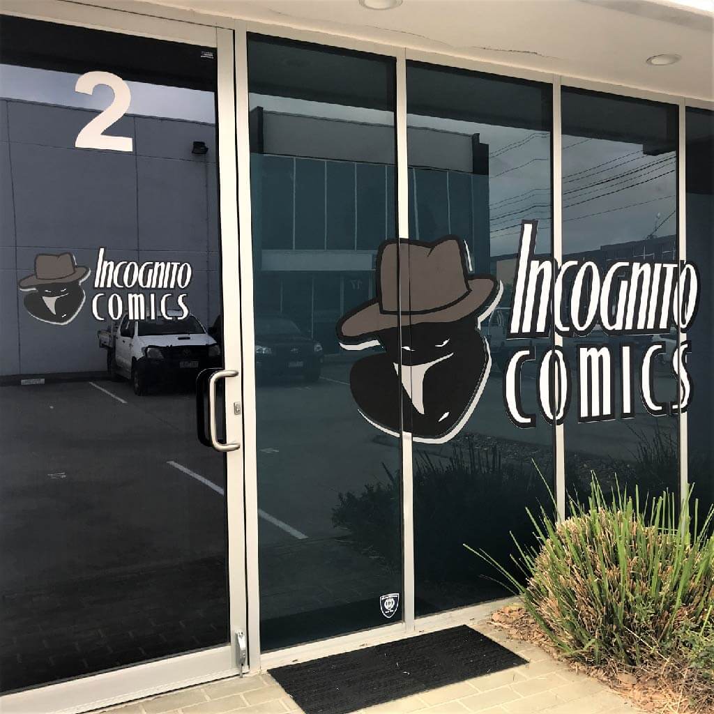 Incognito Comics front window signage