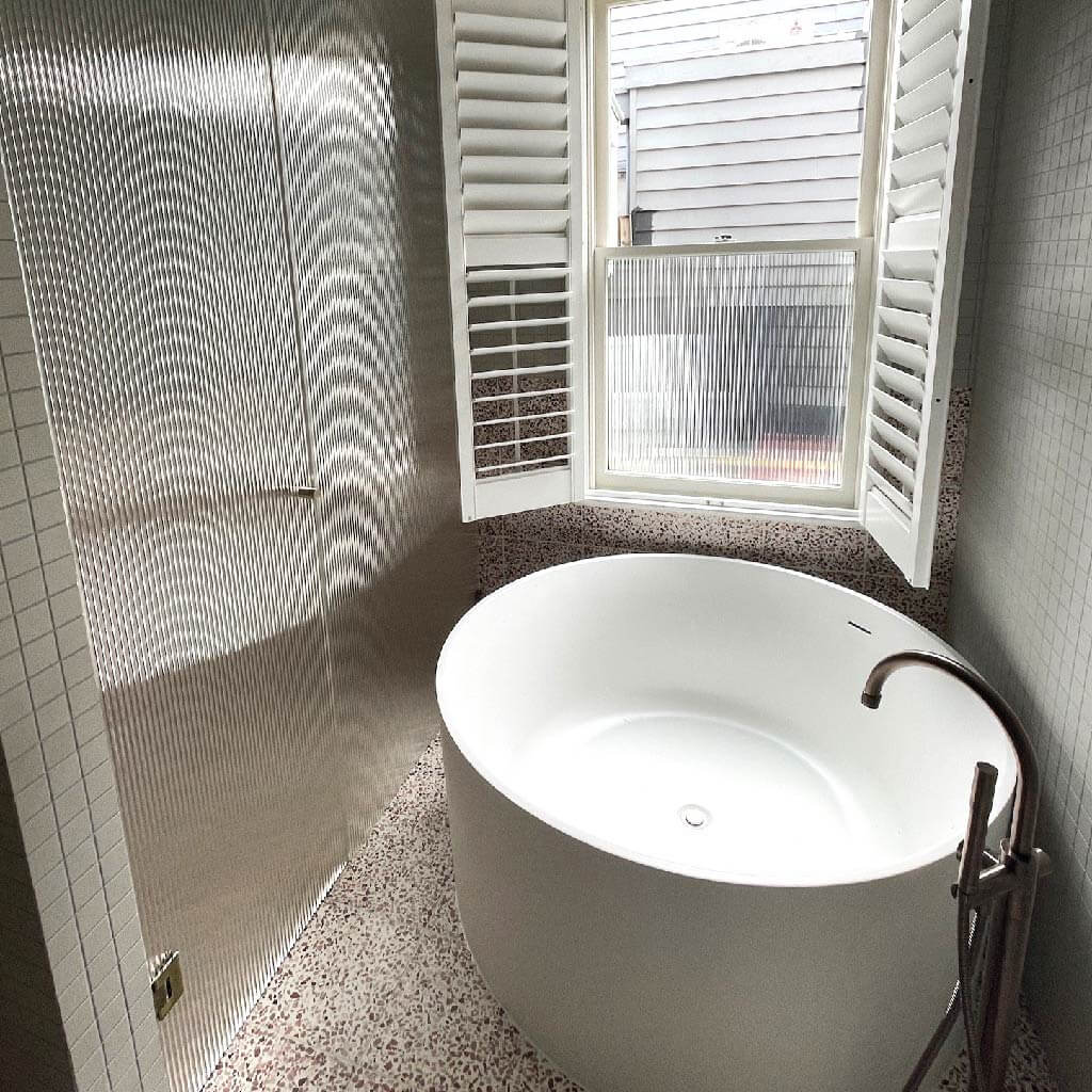 Bathroom renovation with Reeded window film