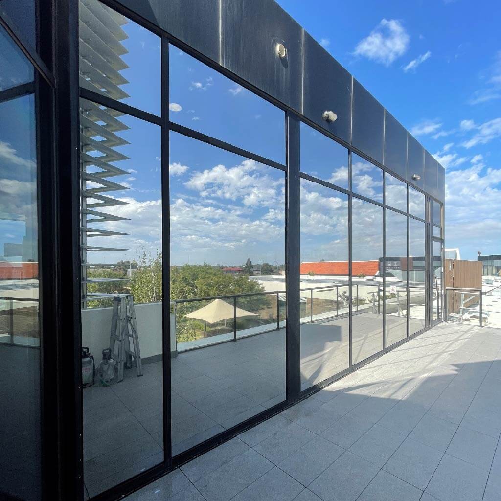 External reflective window film on glass