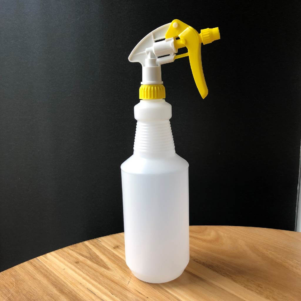 Water spray bottle in yellow